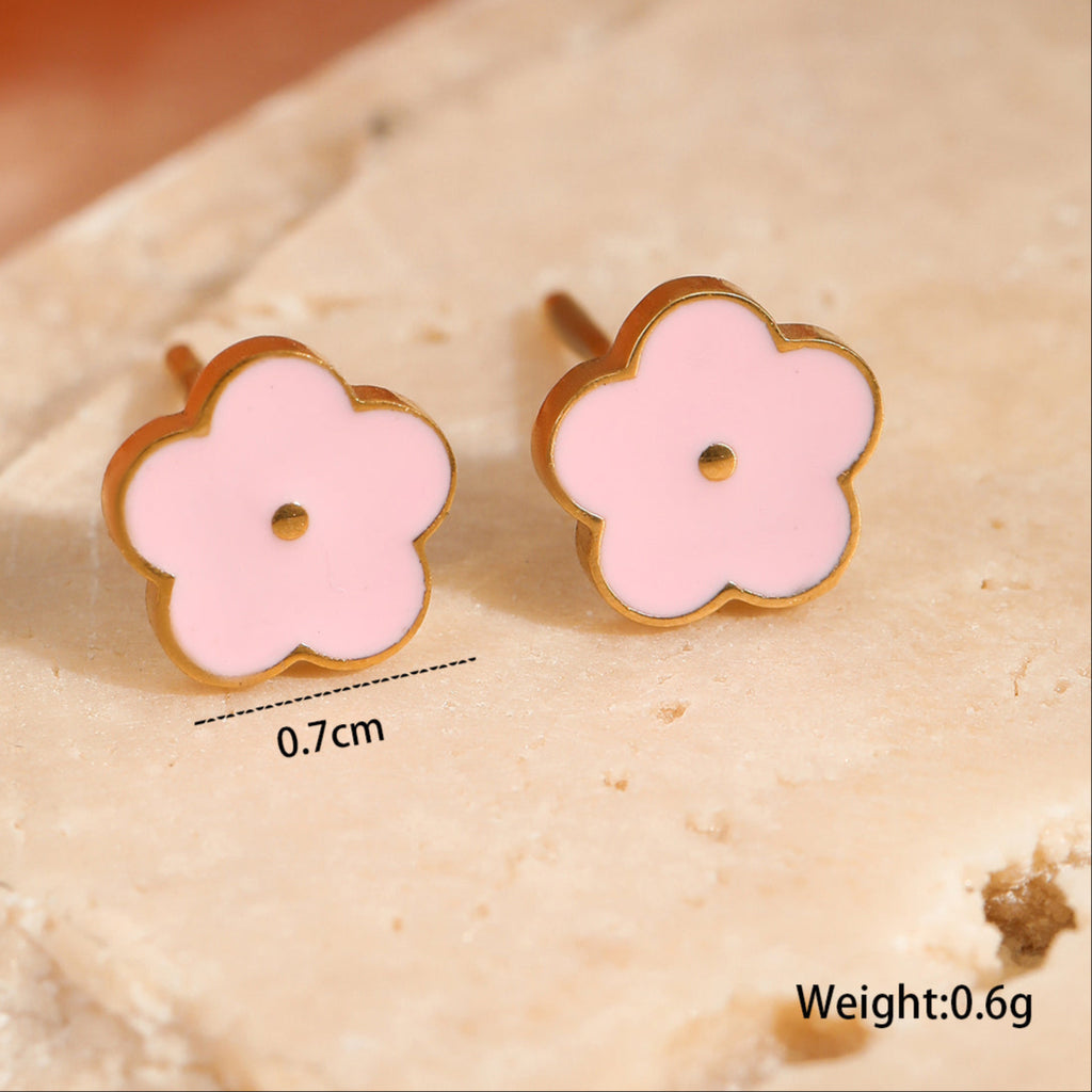 Daisy Flower-shaped earrings with pink centres and gold plating