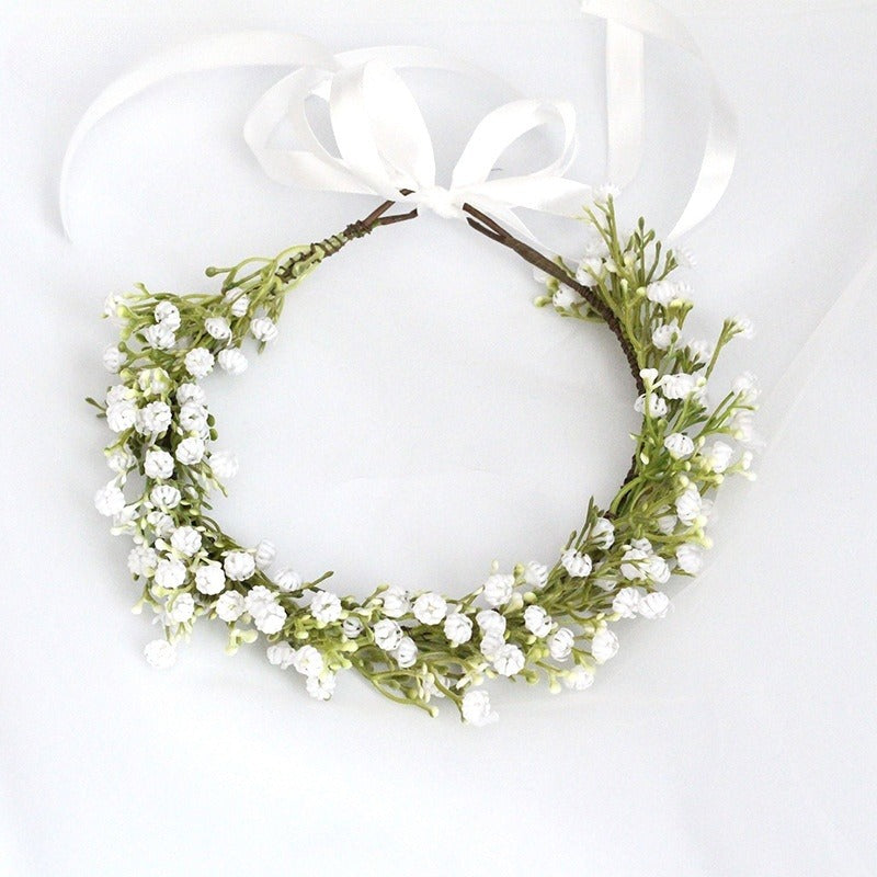 Charlotte white and green baby’s breath floral hair crown wreath for flower girls, perfect for weddings and special occasions.